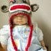 Sock monkey earflap hat