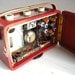 1960's Collectible Roberts R200 Transistor Radio in red. Leather-covered teak case. English early 60's vintage. Fully working