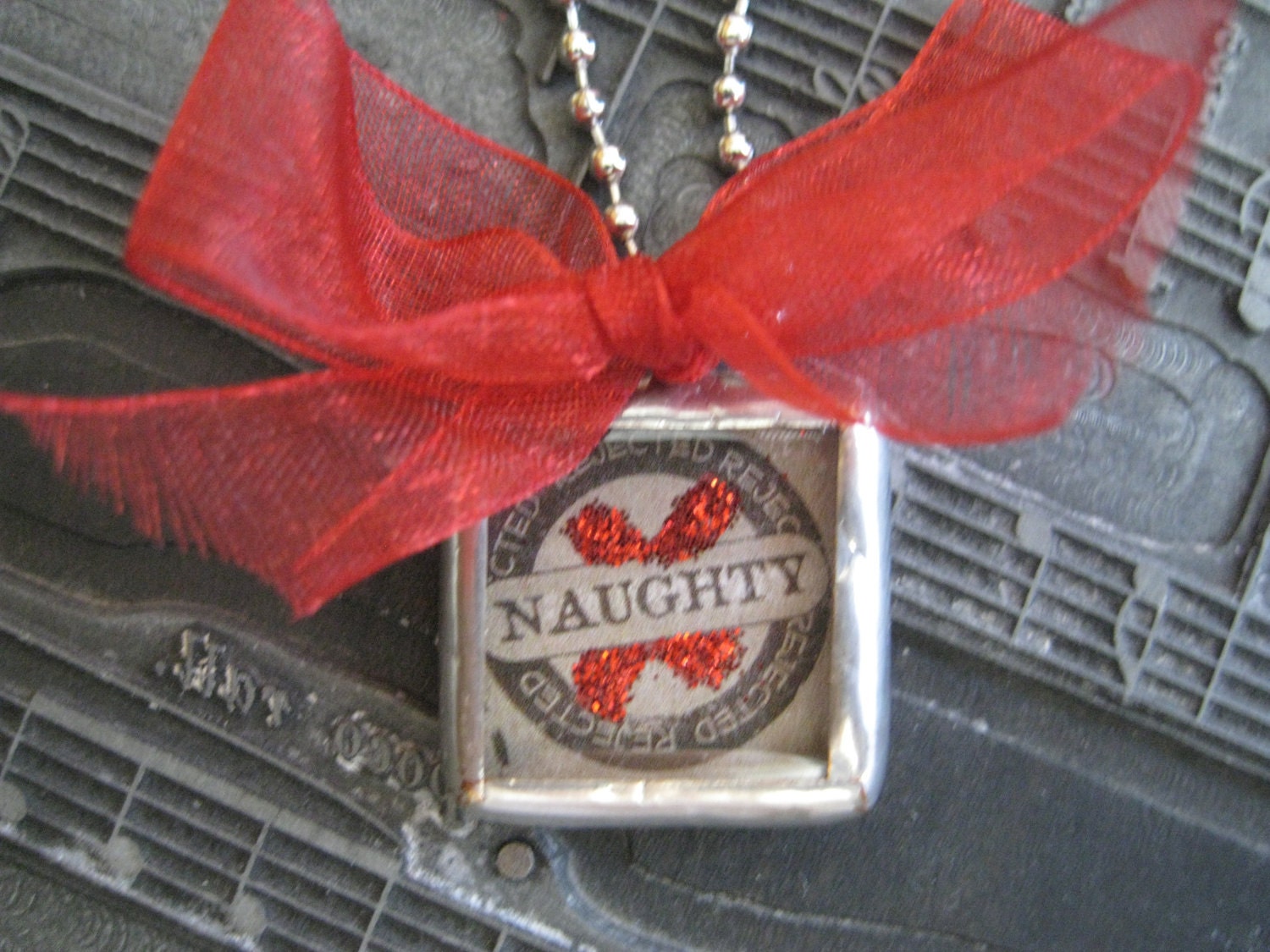 Silver Solder & Glass "Naughty" Pendant