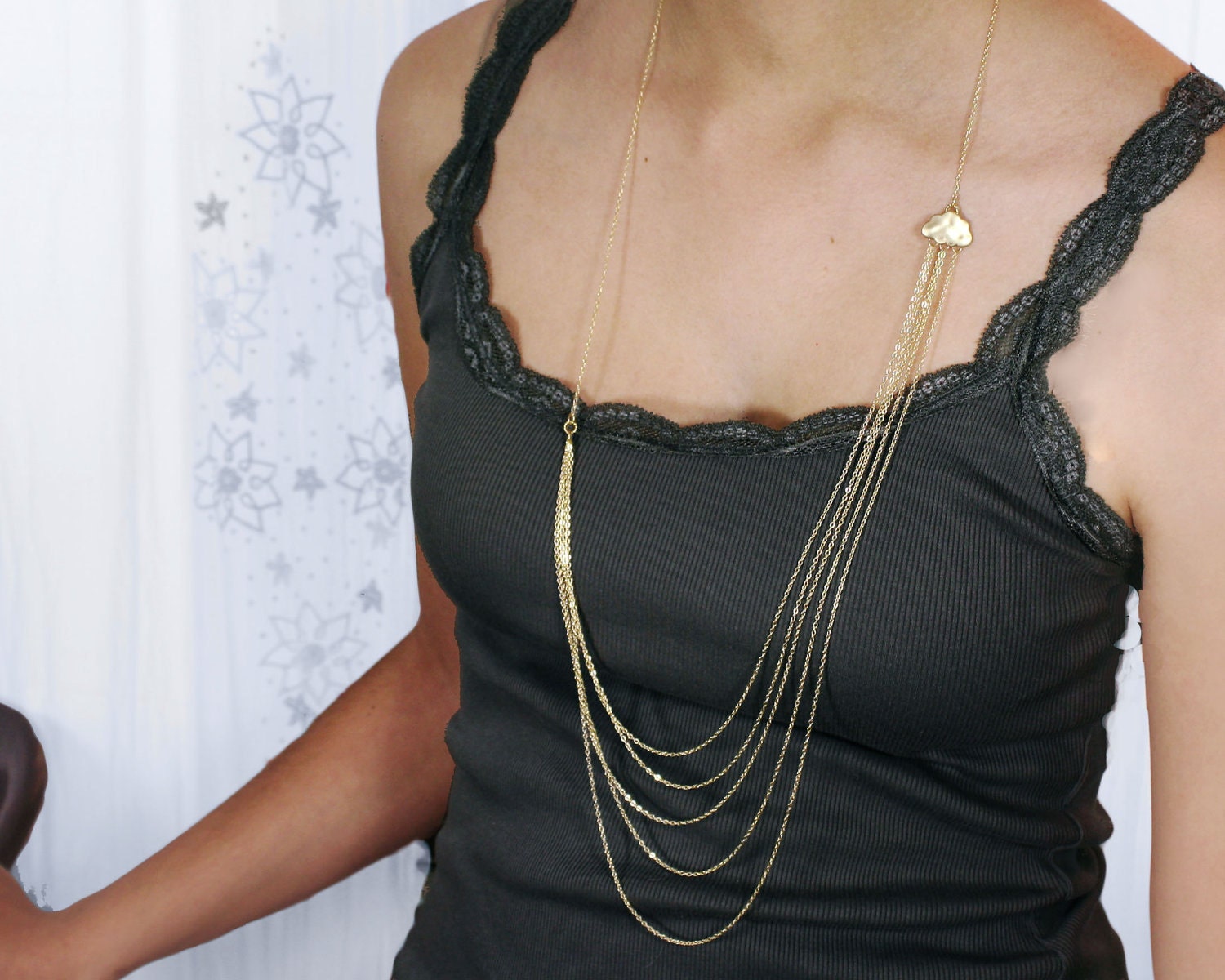 Dauphine D'eau:  Rain  necklace. Cascading layers of gold filled chain and an 18k gold plated rain cloud. A Long multi chain necklace