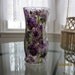 Vase with purple flowers