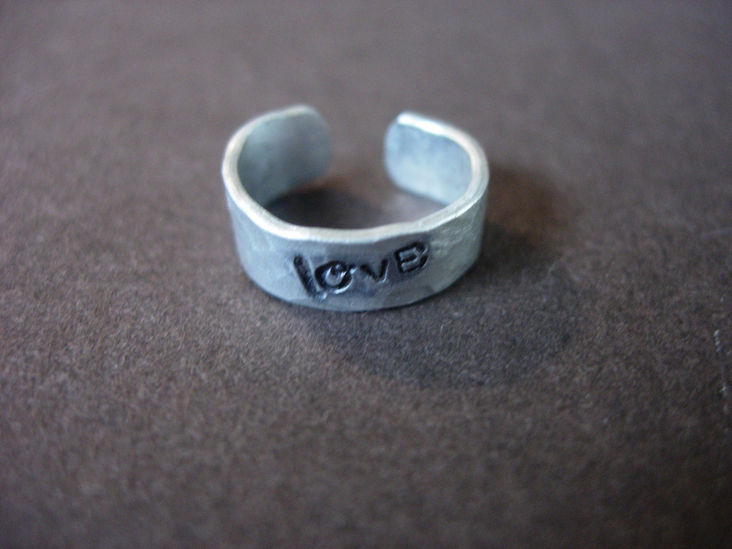 Ear Cuff, Hand Hammered Aluminum with LOVE stamped into the metal and blackened