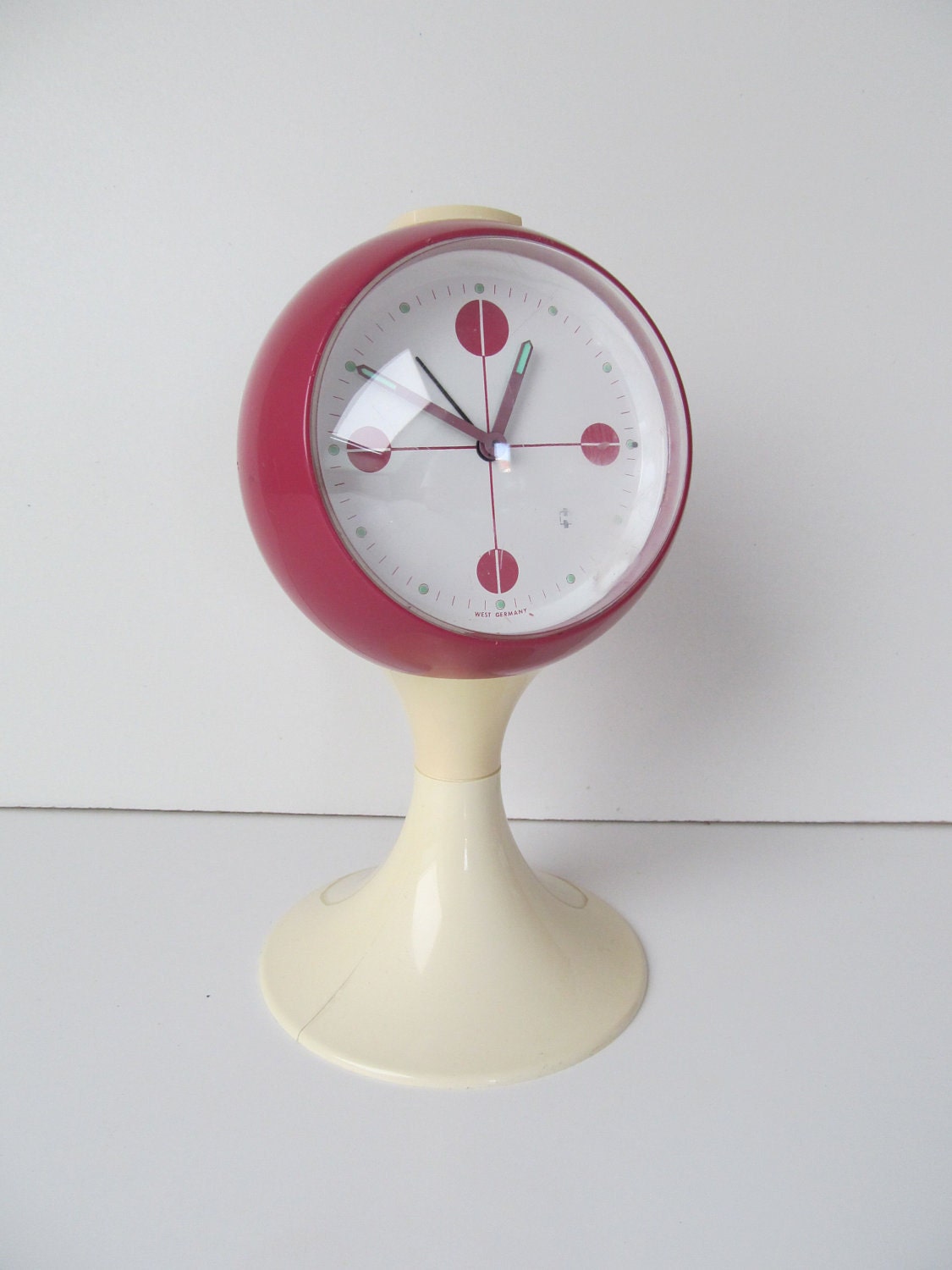 Pedestal retro alarm clock from the seventies vintage