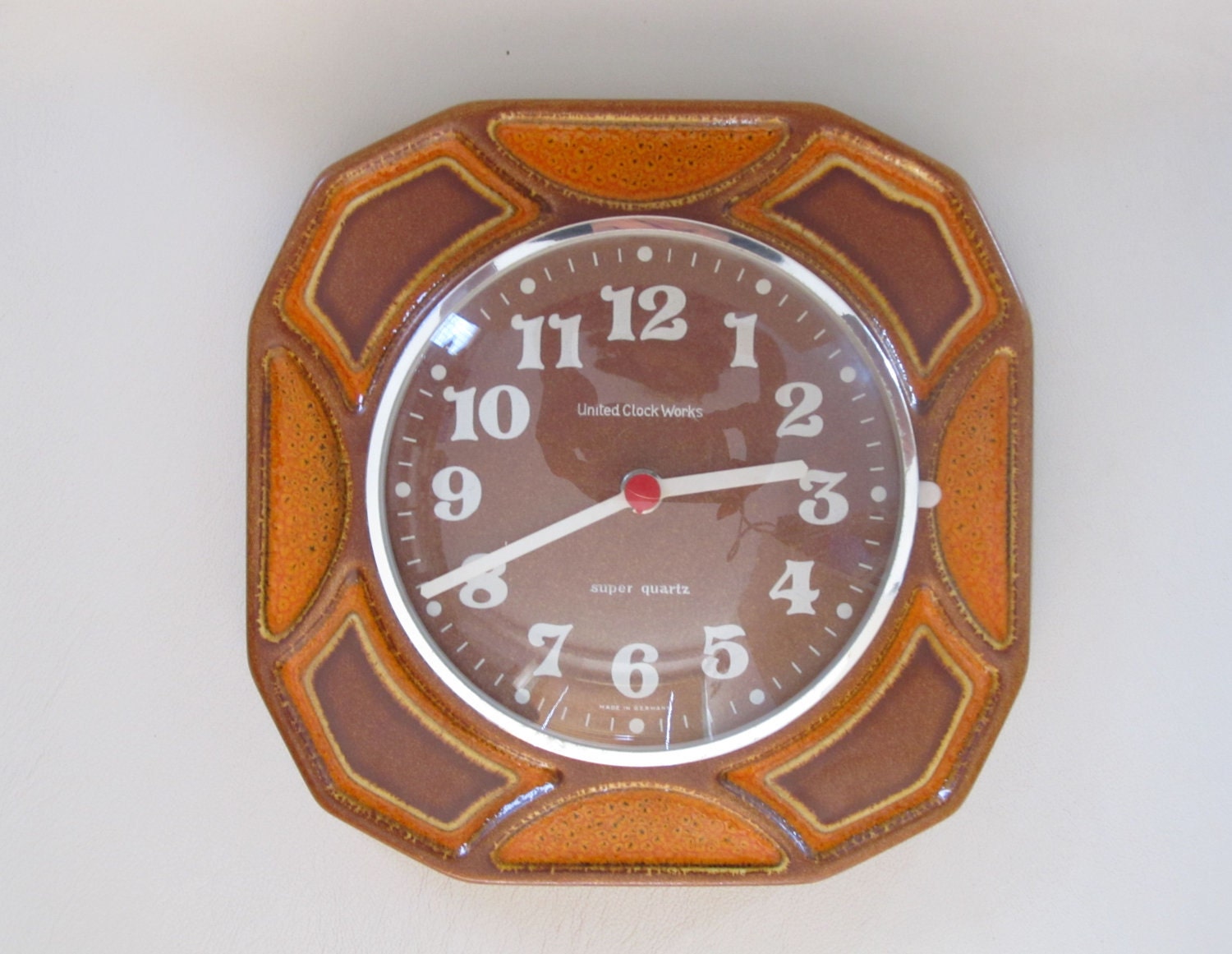 Vintage ceramic wall clock made in Germany by "United Clock Works"