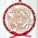 Rose ornament Intricately cut in solid cherry