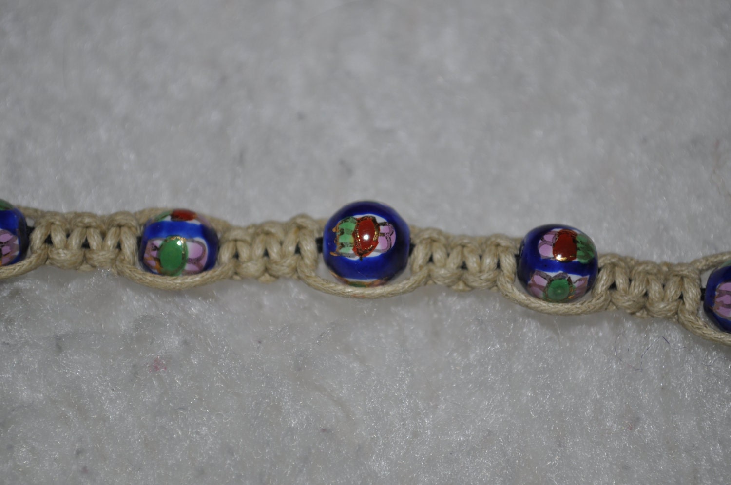 handmade macrame cord bracelet with blue cloisonne beads