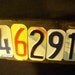 Custom made 5 number address sign made with recycled license plates.