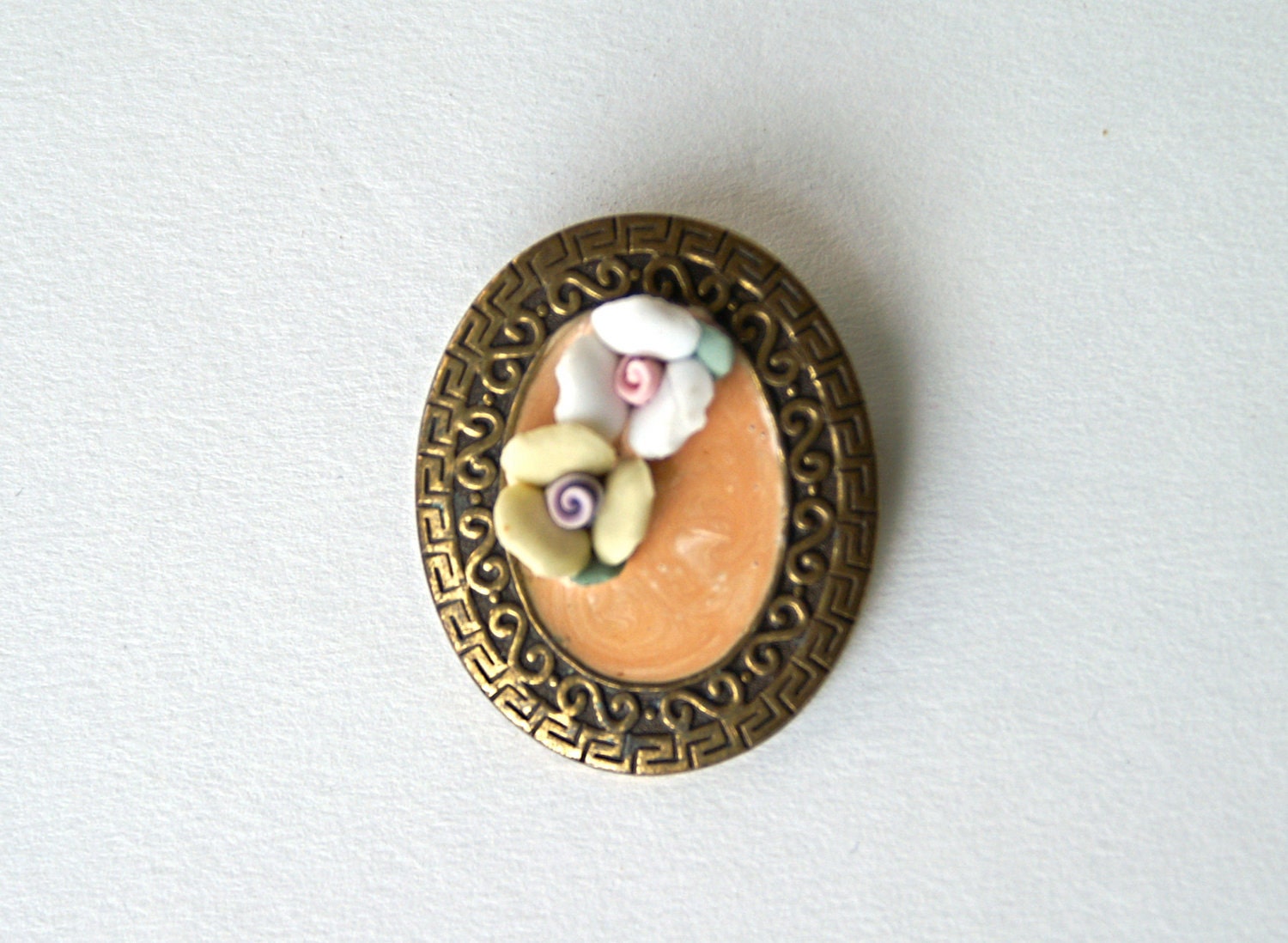 Vintage Cameo Style Flower Brooch, Peach Swirl Enamel with White and Yellow Porcelain Roses in an Ornate Brasstone Setting