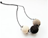 Crochet necklace in color of coffee with cream on chain