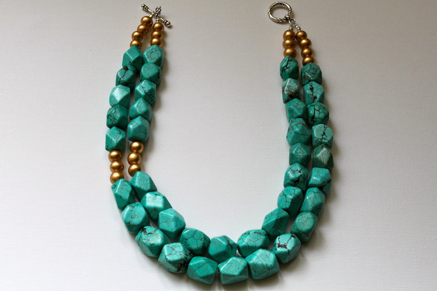 The Viceroy - turquoise howlite faceted nuggets accented with gold wood beads - ZolieDesigns