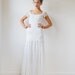 Beautiful low back French lace & silk chiffon wedding dress with capped sleeves