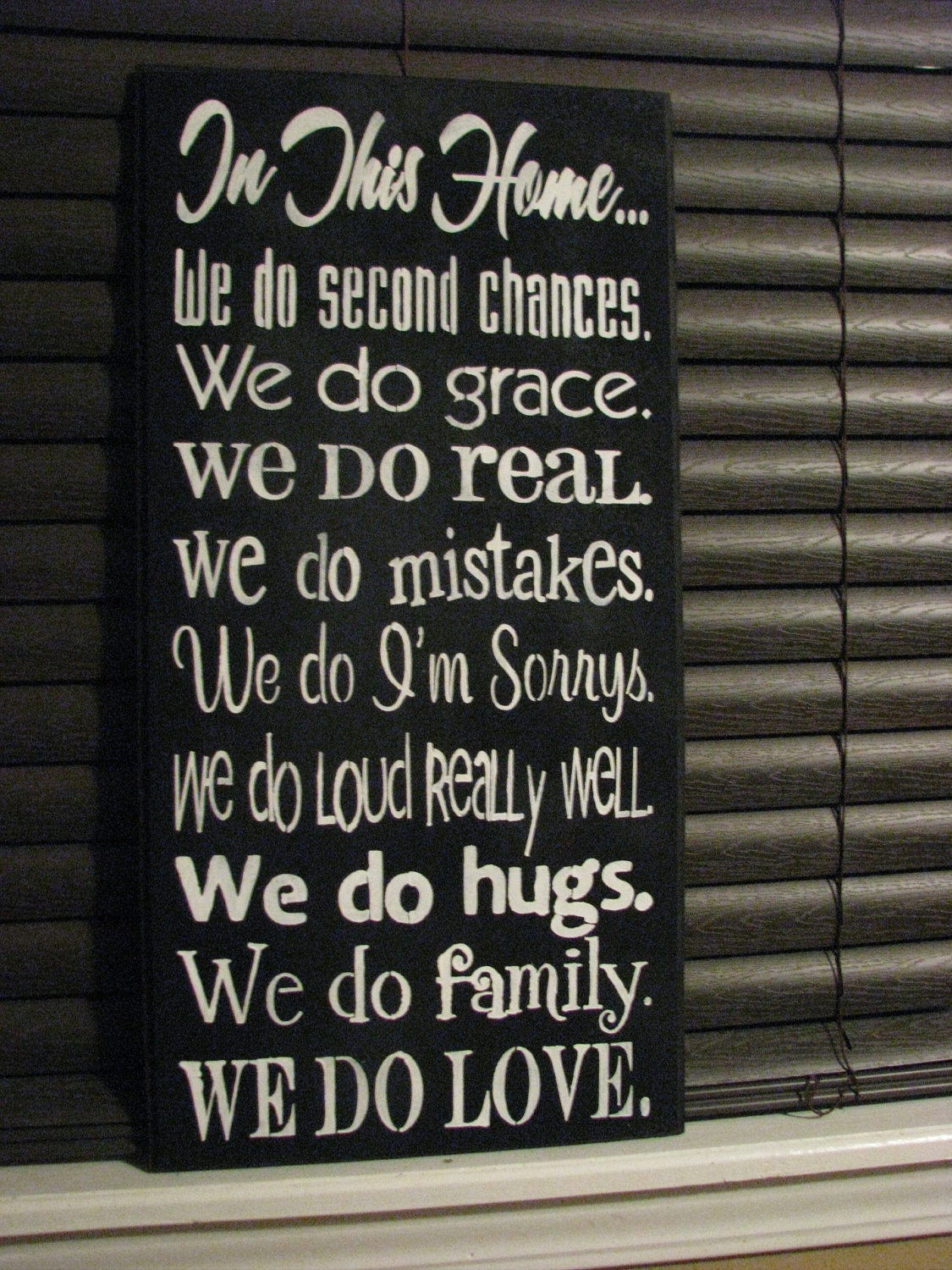 In this house sign