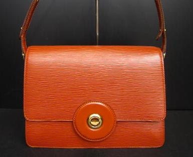 Vintage Louis Vuitton rare epi mod purse, brown. very chic and mod