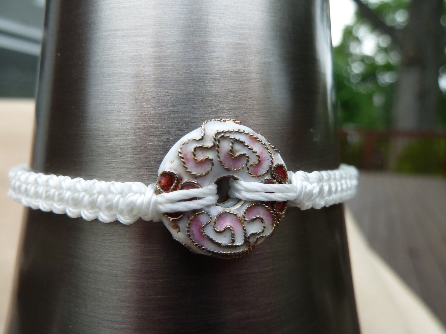 White Macrame Bracelet with a Cloisonne donut & Sliding Adjustable Closure