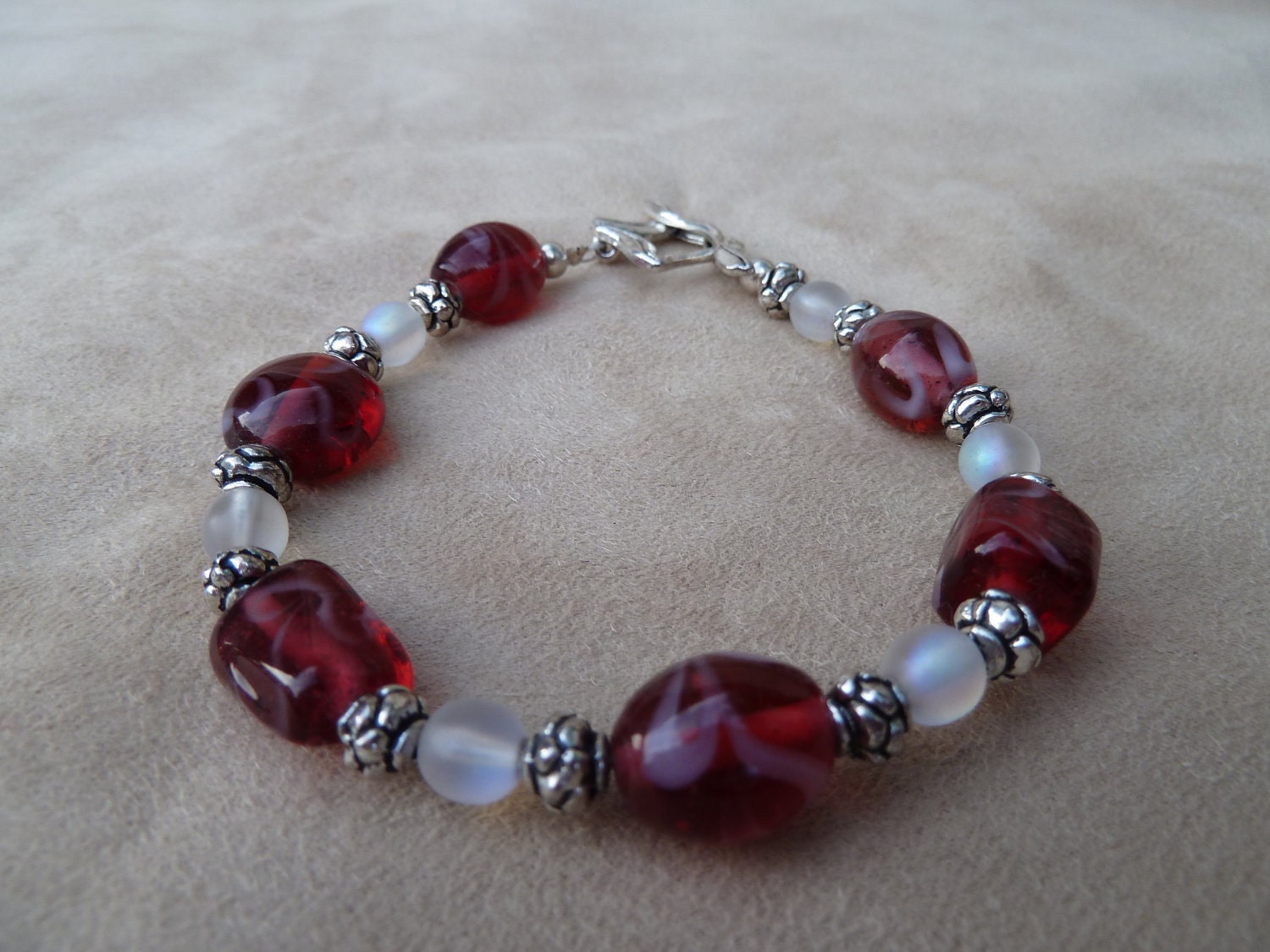 Dark Pink with White Swirl Glass Bead Bracelet on with Toggle Closure