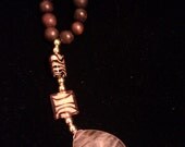 Beautiful african inspired necklace with amber tear pendant