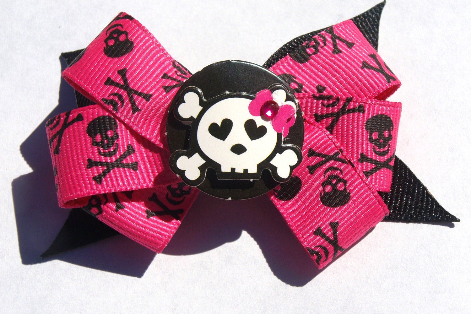 hot pink and black skull and cross bones bow- girly skull bow- girls punk accessories