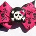 hot pink and black skull and cross bones bow- girly skull bow- girls punk accessories