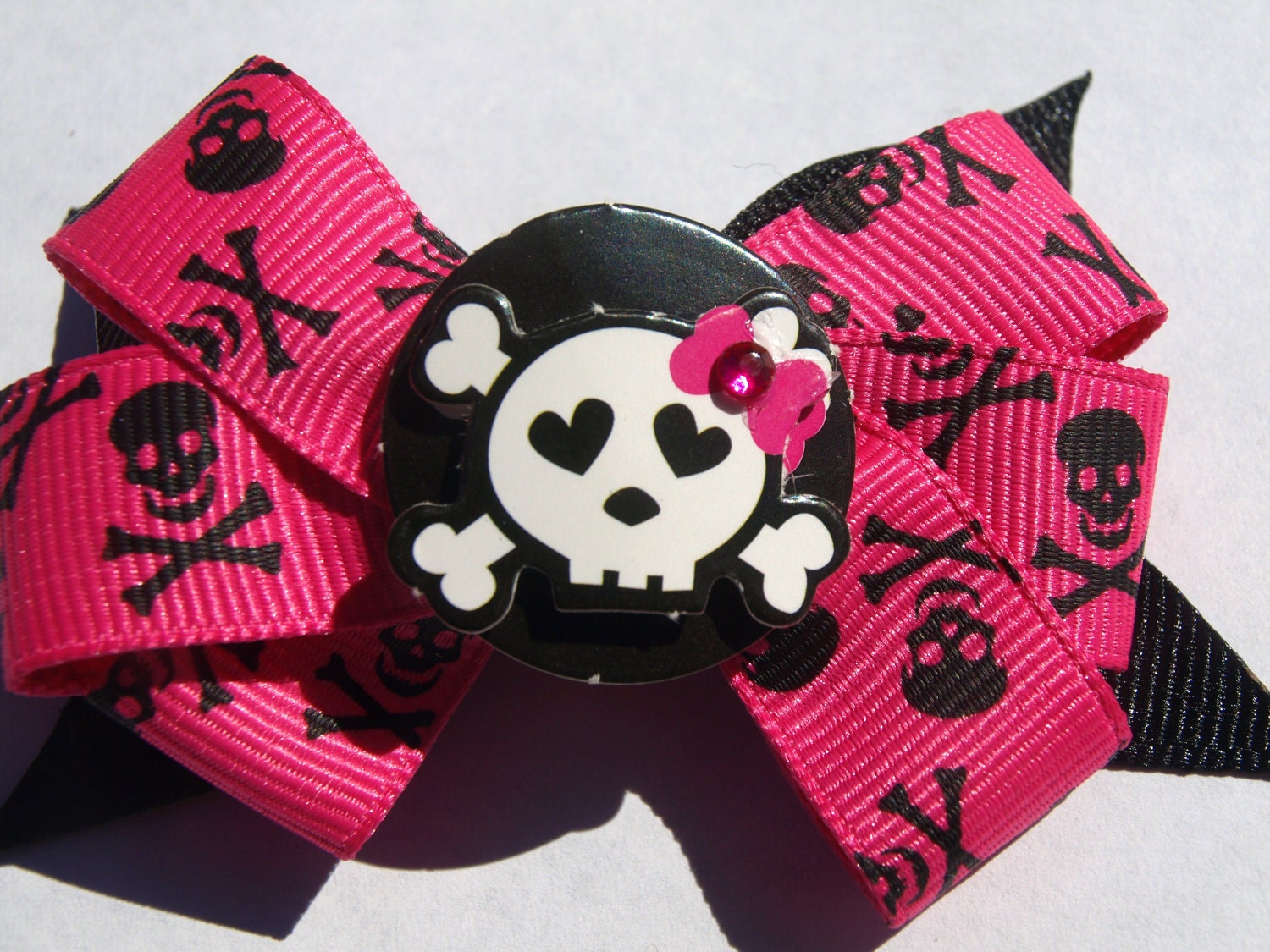 hot pink and black skull and cross bones bow- girly skull bow- girls punk accessories