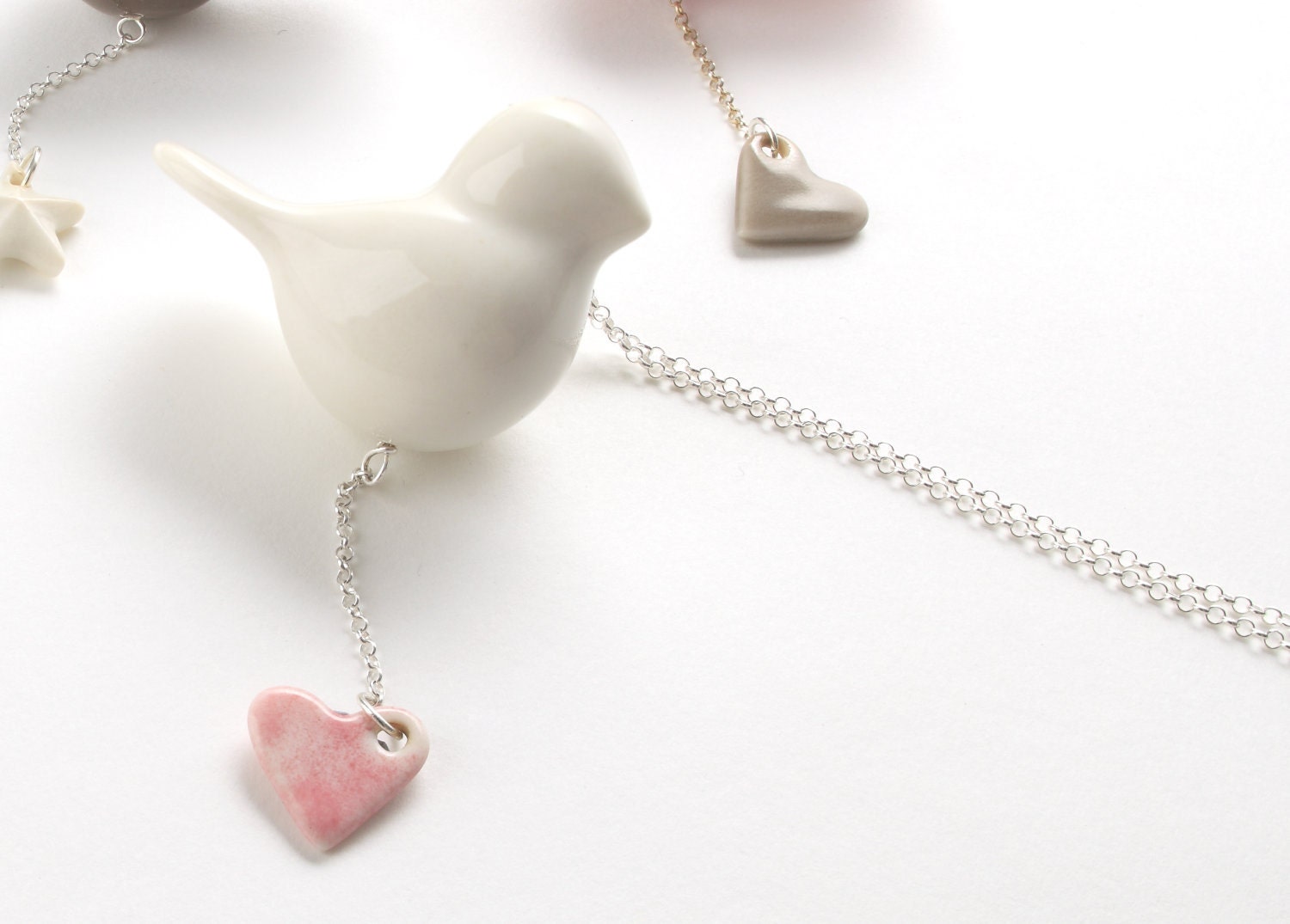 porcelain and silver bird necklace, white bird with pink heart.