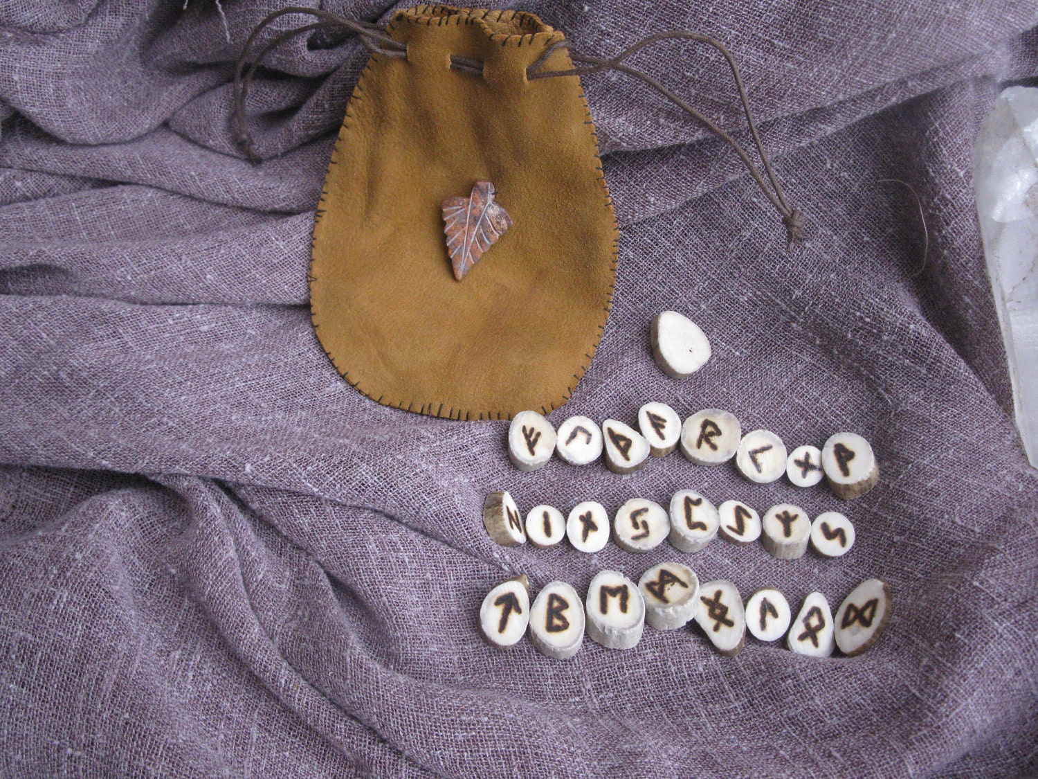 burnt deer antler elder futhark rune set with buckskin pouch and stone leaf amulet