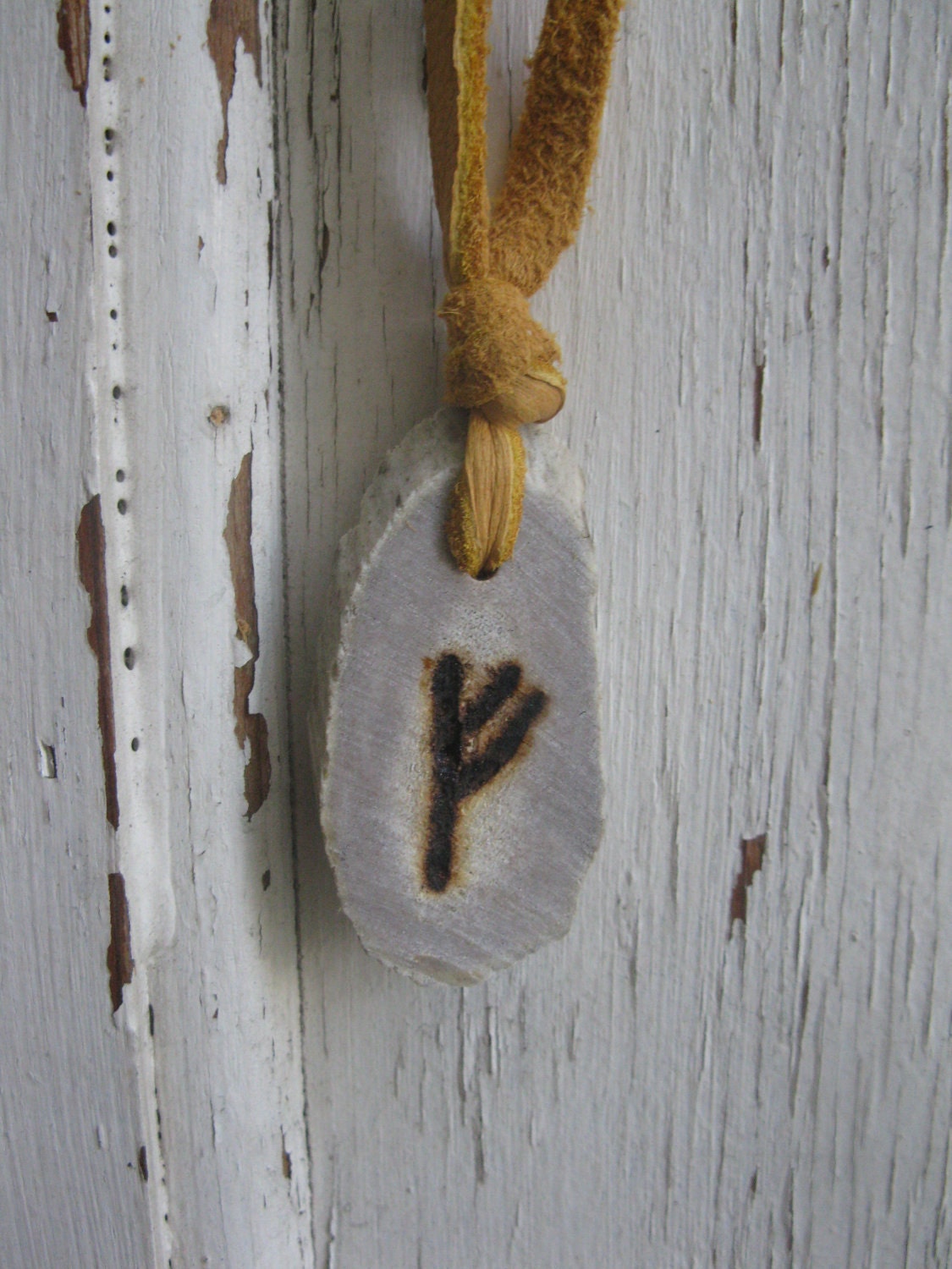fehu deer antler shed rune pendant on yellow buckskin