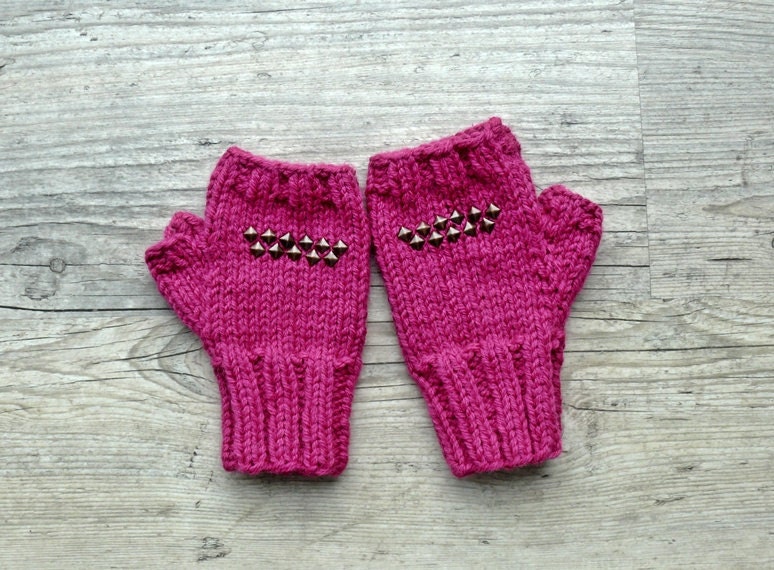 Pink fingerless mittens with studs