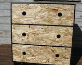 modular OSB stained black dresser with black hole pulls