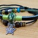 DIY Jewery ,Friendship  leather bracelets bangle ---   green ceramic bead ,silver metal butterfly,blue  wooden beads ,adjustable length rope