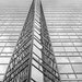 Black and White Photography Looking Up at Glass Triangles on Office Building