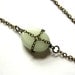 Extra Long Necklace with Green Milk Glass Accent and Skeleton Key Reclaimed Library Card Pendant