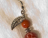 Dangle Earrings with Carved Stone, Coral Beads and Tibetan Silver Beads & Leaf Charms