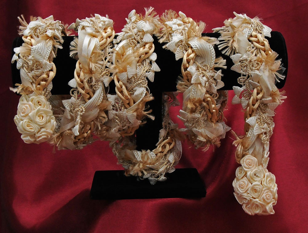 Handfasting cord in shades of gold, with elaborate trim and gold satin braid.  Ends are capped, ready for beads of your choice