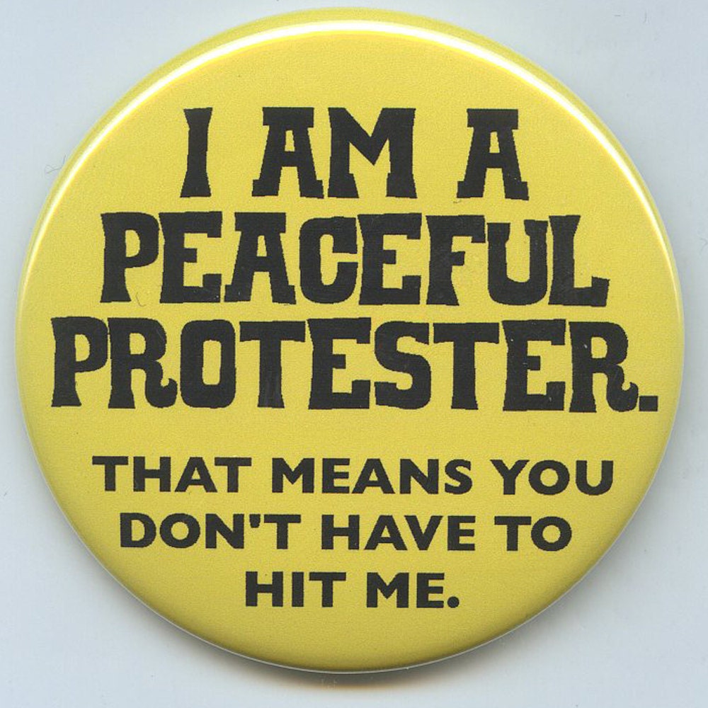 Peaceful Protester Means you don't have to hit me button.