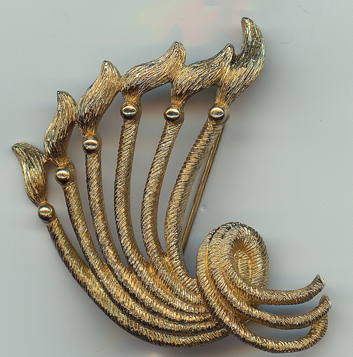 Vintage Monet Goldtone Brooch.