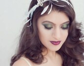 Vintage rhinestone brooch and feather headband