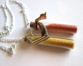Yellow and Orange pixie dust necklaces