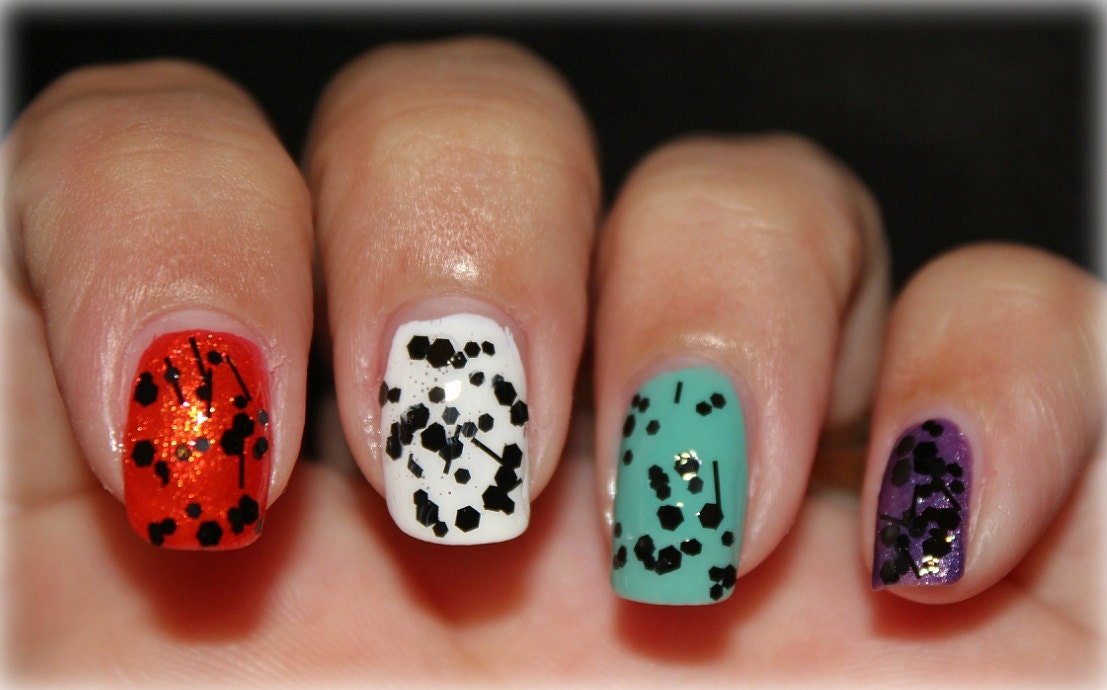 Spotty Dottie Dark - clear base with black glitter nail polish
