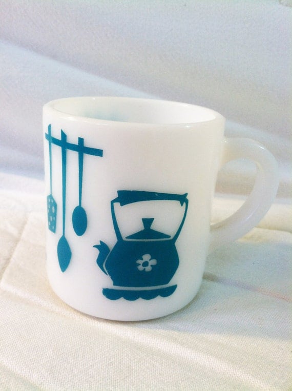 Vintage milk glass mug with teal design