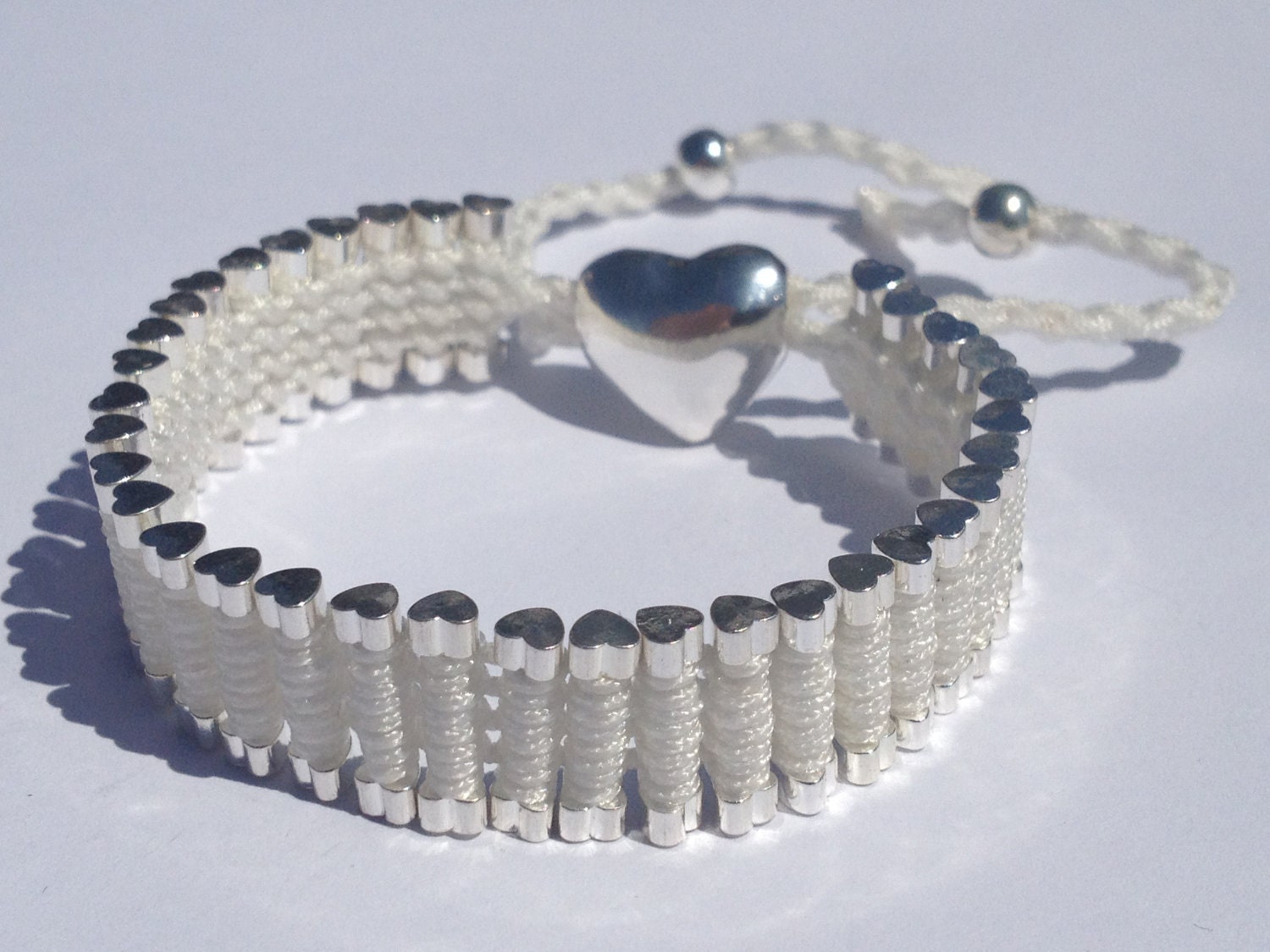 Friendship Heart Link Bracelet. Silver Plated Woven in White Macrame. (Similar to the Links of London Brand)