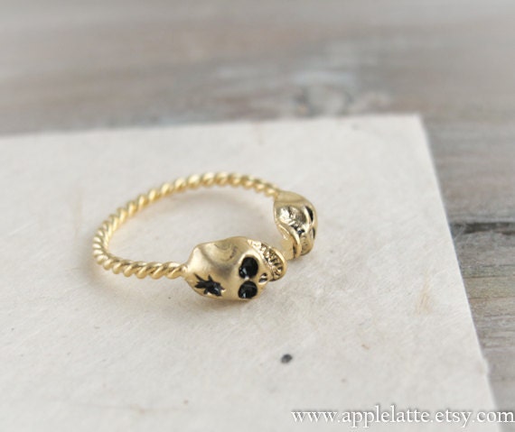 tiny gold skull heads ring