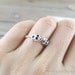tiny gold skull heads ring