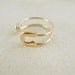 gold safety pin ring us ring size 5 1/2- 8