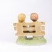 Vintage pastels porcelain figurines. Children and dog.