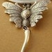PIECE UNIQUE - Collier papillon monté sur cuir brut couleur chocolat
