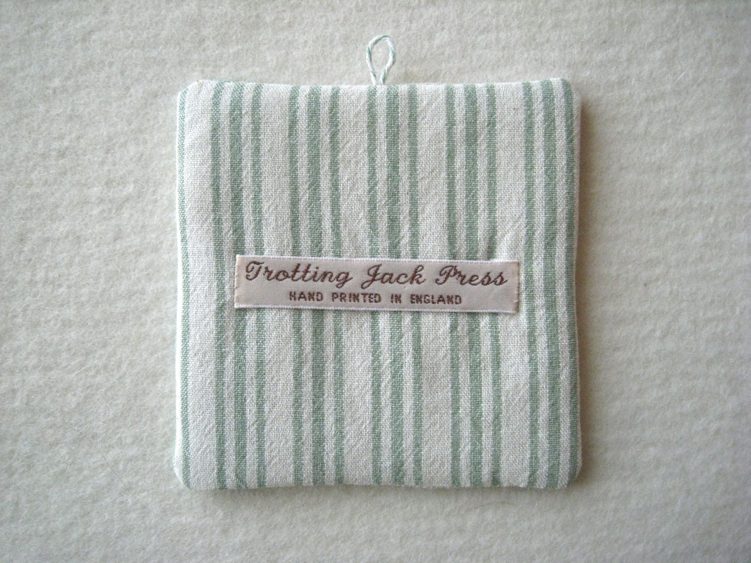 PATCHWORK WALL HANGING - hand lino printed Jack Russell Terrier, shade of green