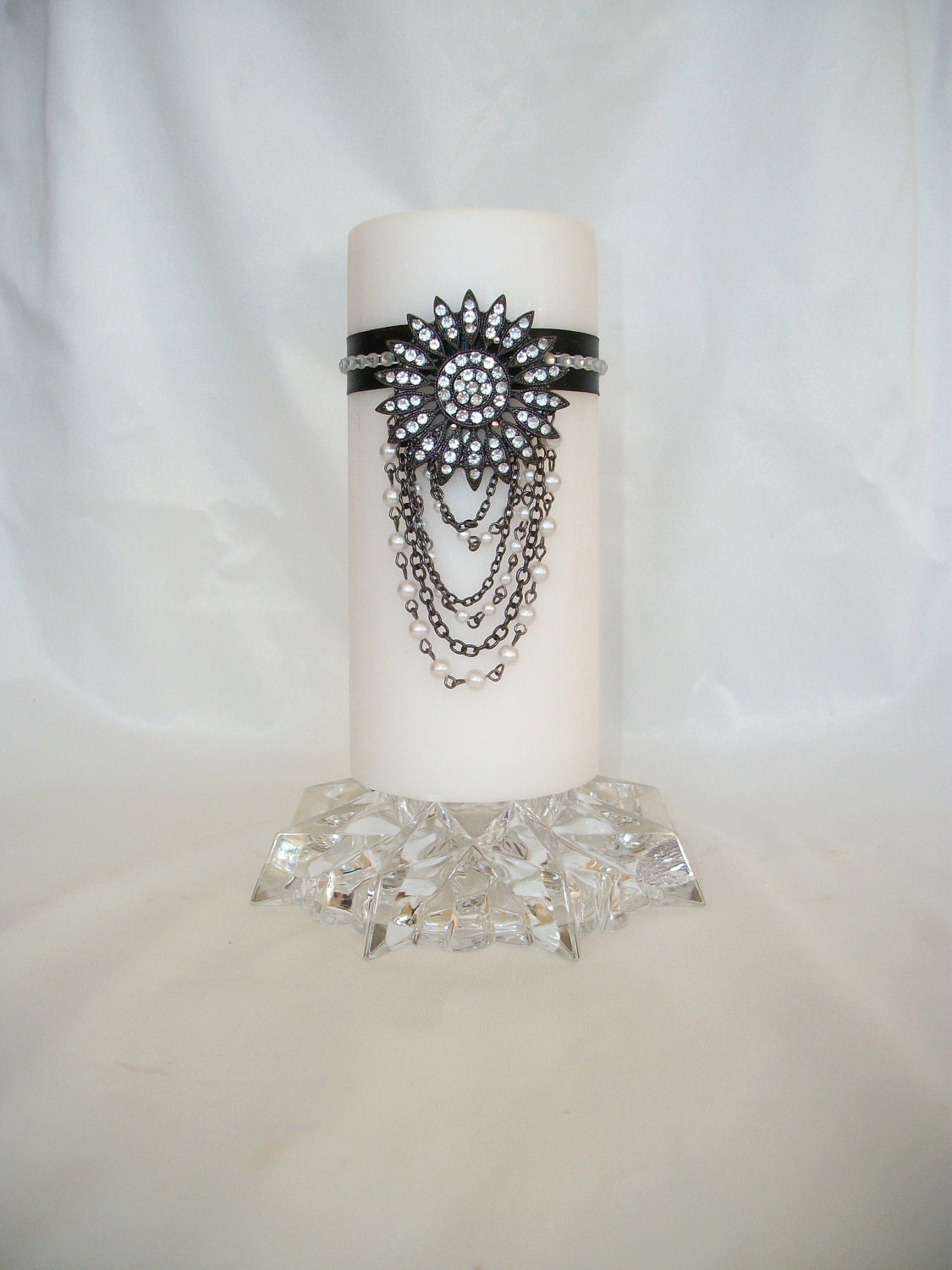 Decorative Scented White Pillar Candle, Rhinestone & Pearl Medallion, Rhinestone Chain, Black Satin Ribbon