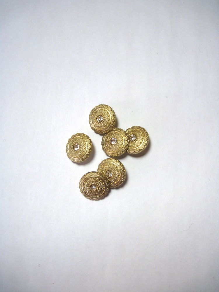 Vintage gold coloured buttons with gem