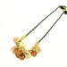 Tiny Skull Bracelet - Gold Skull Charms on Gold & Black Delicate Chain with Black Faceted Pendant