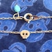 Tiny Skull Bracelet - Matt 14k Gold Plated Skull Charm on Gold Delicate Chain with Mint Faceted Bead